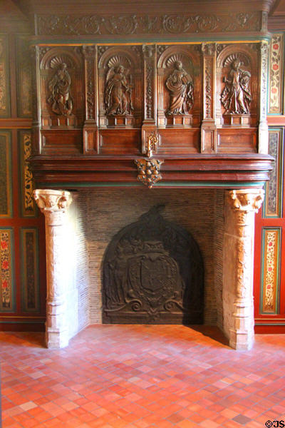 Fireplace (early 16thC) with sculptures of Archangel Gabriel, Ste Marguerite, Virgin Mary, & Ste Madeleine which came from Abbey of St Amand at Rouen Ceramic Museum. Rouen, France.