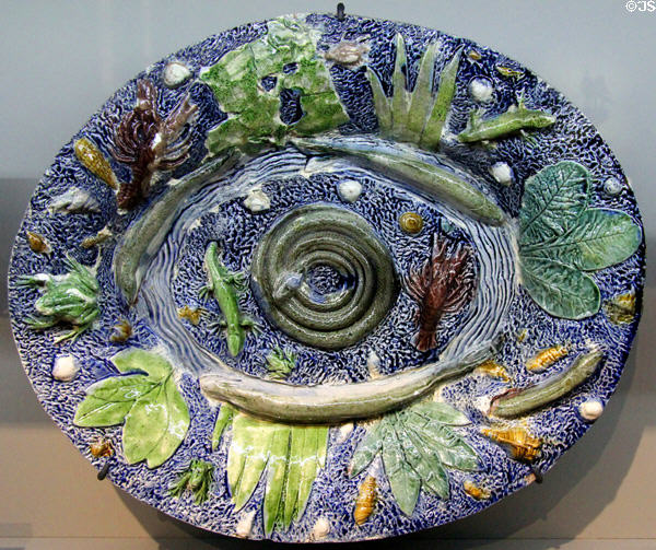 French glazed earth basin with creatures in style of Bernard Palissy (start 17thC) at Rouen Ceramic Museum. Rouen, France.