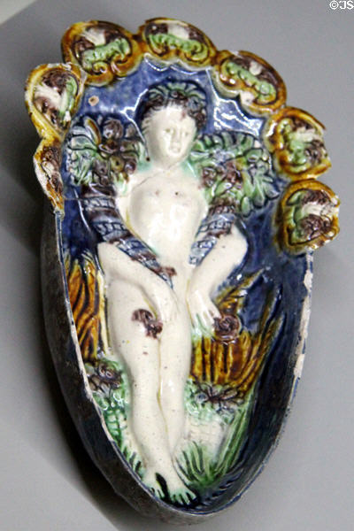 French glazed earth oval gondola bowl with female figure in style of Bernard Palissy (start 17thC) at Rouen Ceramic Museum. Rouen, France.