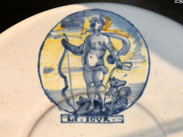 Earthenware Le Jour plate (late 17thC) by Edme Poterat of Rouen at Rouen Ceramic Museum. Rouen, France.
