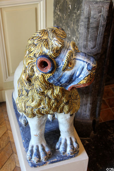 Rouen-made earthenware lion painted blue, yellow & red (c1740) at Rouen Ceramic Museum. Rouen, France.