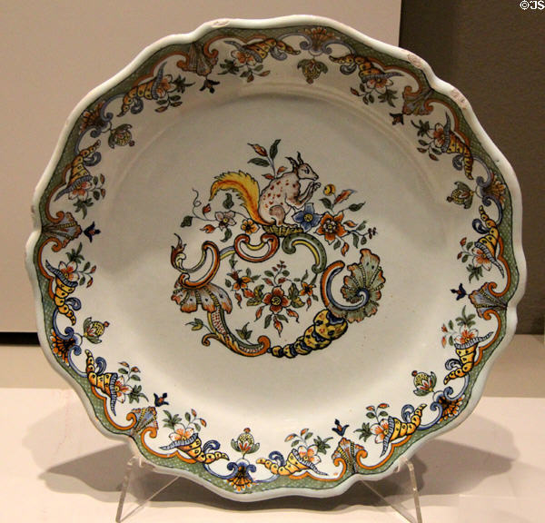 Polychrome plate with squirrel (c1750) by Pierre Paul Caussy of Rouen at Rouen Ceramic Museum. Rouen, France.