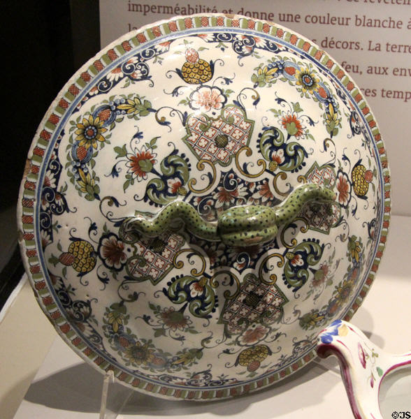 Polychrome tureen cover with snake handle (end 18thC) from Rouen at Rouen Ceramic Museum. Rouen, France.