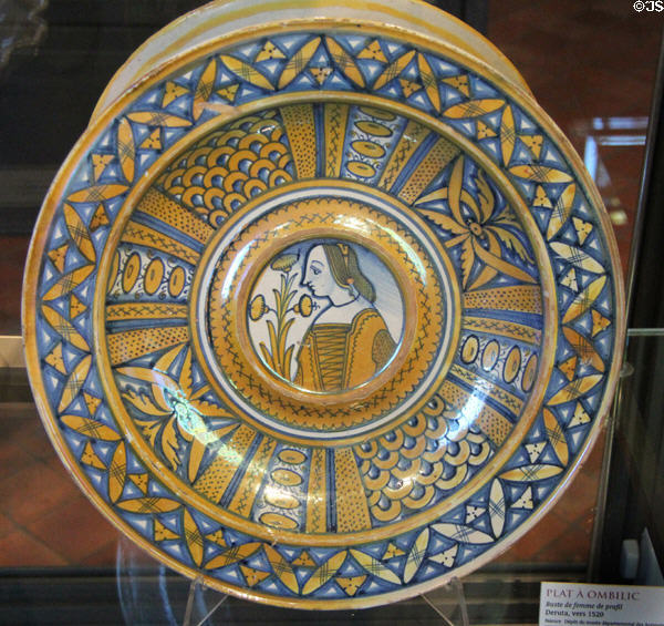 Earthenware navel dish with profile of woman (c1520) from Deruta, Perugia, Italy at Rouen Ceramic Museum. Rouen, France.