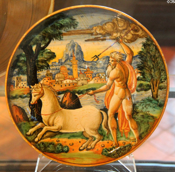 Earthenware plate with Neptune creating the horse (1539) from Urbino, Italy at Rouen Ceramic Museum. Rouen, France.