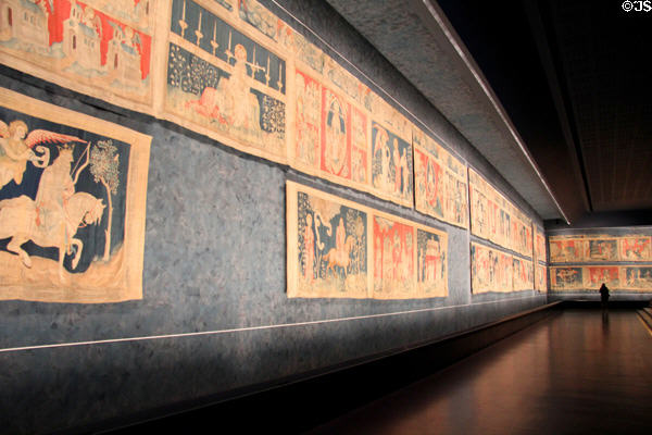 Gallery containing the Apocalypse Tapestry in part created in Paris workshop of Robert Poinçon (mid-14thC) which depicts New Testament Revelation of John of Patmos at Angers Chateau. Angers, France.