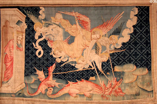 St Michael fights the dragon from Apocalypse Tapestry at Angers Chateau. Angers, France.