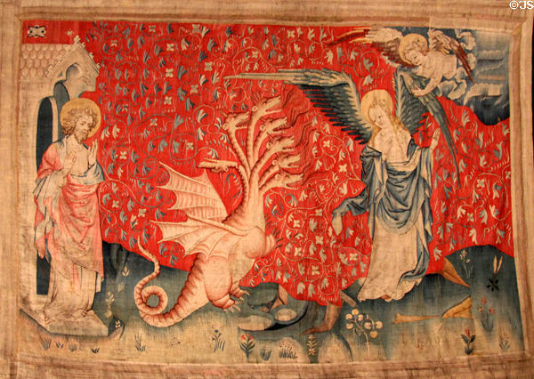 Woman is given wings from Apocalypse Tapestry at Angers Chateau. Angers, France.