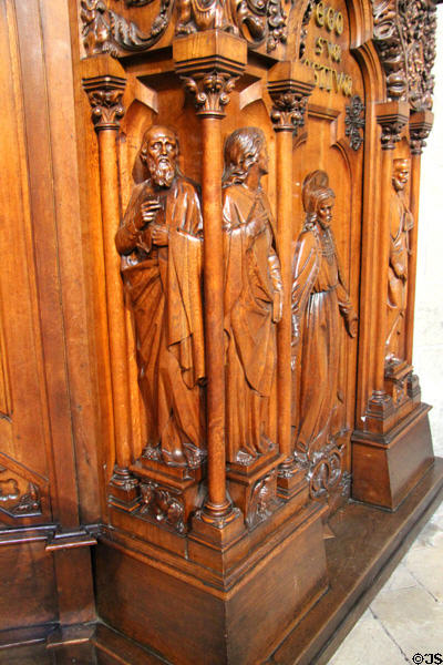Evangelists Luke & John carved at base of pulpit at St Maurice of Angers Cathedral. Angers, France.