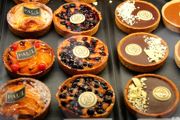 Fruit & chocolate tartelettes in Paul's bakery window. Angers, France.