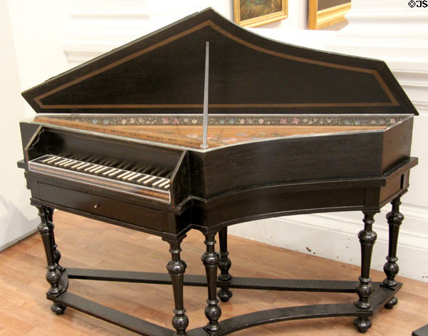 Spinet piano (1710) of olive wood made by Nicolas Blanchet of Paris at Angers Fine Arts Museum. Angers, France.