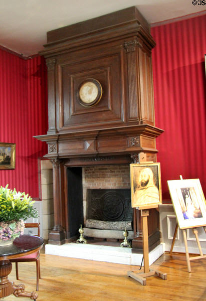 Wooden fireplace & portrait of Emir Abd al-Kadar, State prisoner from 1848-52 in Music room in Royal Lodge at Chateau Royal of Amboise. Amboise, France.