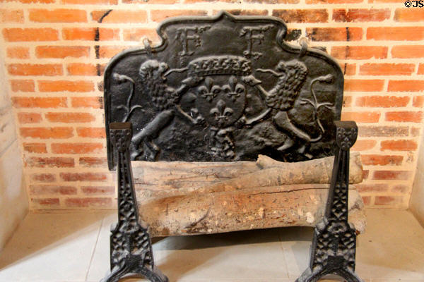 Cast iron fire back with royal crest in Marguerite de Navarre's bedroom at Château de Clos Lucé. Amboise, France.
