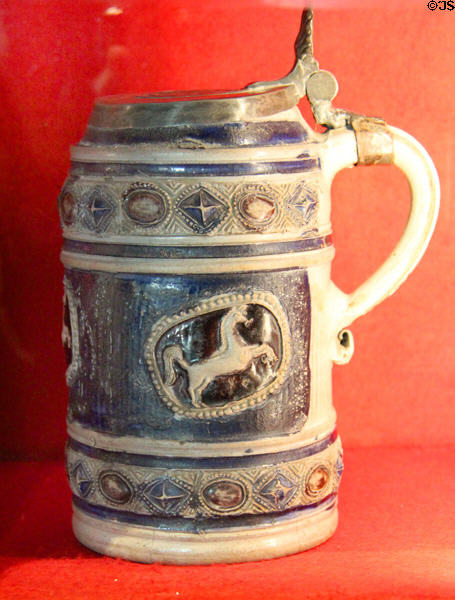 Stoneware covered tankard with horse design in Great Hall at Château de Clos Lucé. Amboise, France.