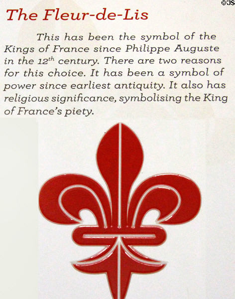 Fleur-de-lis emblem of kings of France since 12thC (a symbol of piety) plaque at Blois Chateau. Blois, France.