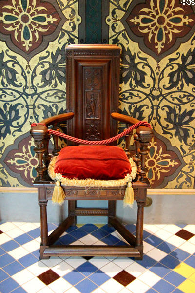 Walnut gossip chair (19thC) from France in Queen's chamber at Blois Chateau. Blois, France.