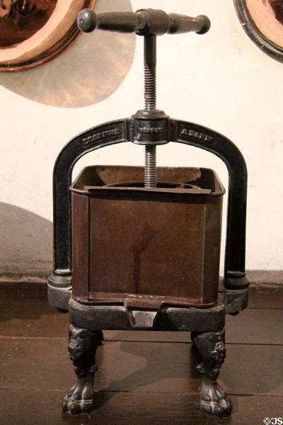 Antique French cast iron press for oil or cider in kitchen at Chenonceau Chateau. Chenonceau, France.