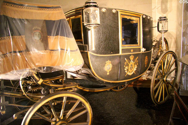 Horse-drawn Berlin carriage of count of Chambord (1873) by Binder Brothers at Chambord Chateau. Chambord, France.