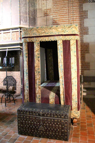 Suspended canopy bed (late 17thC) & travel trunk in Ruggierii Room at Chaumont-Sur-Loire. France.