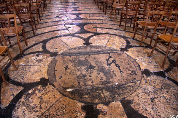 Labyrinth on floor of Chartres Cathedral which pilgrims followed symbolizing long winding path to salvation. Chartres, France.