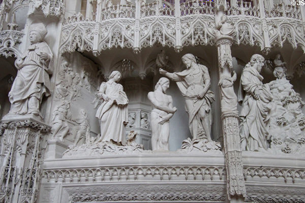 Christ being baptized on carved choir screen at Chartres Cathedral. Chartres, France.