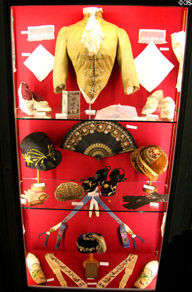 Display of antique clothing accessories in Salon Vauban at Chateau D'Ussé. Ussé, France.