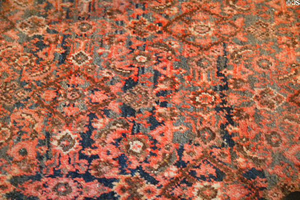 Pink & blue hand woven carpet in King's bedroom at Chateau D'Ussé. Ussé, France.