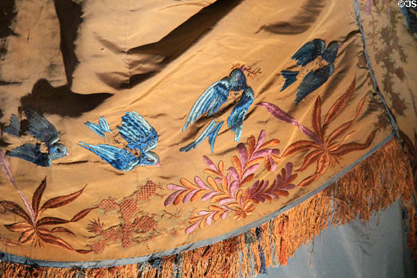 Embroidery detail of gown on display in King's bedroom at Chateau D'Ussé. Ussé, France.