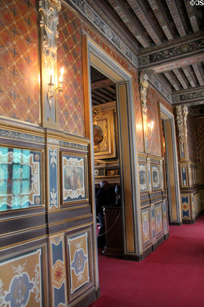 Highly decorated dining room hallway at Cheverny Chateau. Cheverny, France.