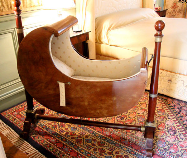 Rare Empire-style Mahogany cradle in Birth chamber at Cheverny Chateau. Cheverny, France.
