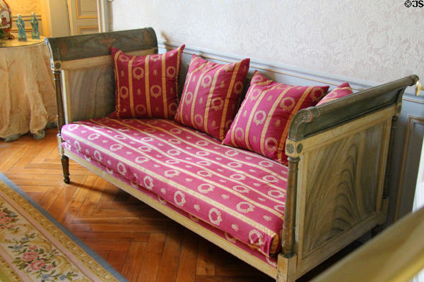 Empire-style settee in dressing room at Cheverny Chateau. Cheverny, France.
