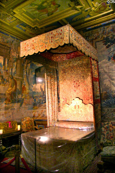 Canopied four poster bed with Persian embroidery (16thC) used by Henri IV in King's bedchamber at Cheverny Chateau. Cheverny, France.