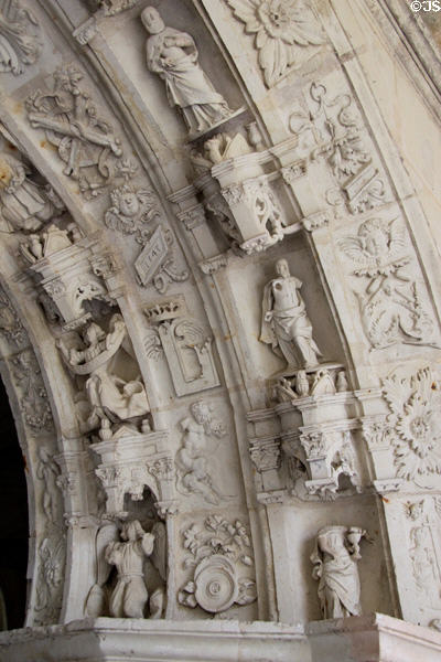 Detail of carved arch (1543) within cloister at Fontevraud Abbey. Fontevraud, France.