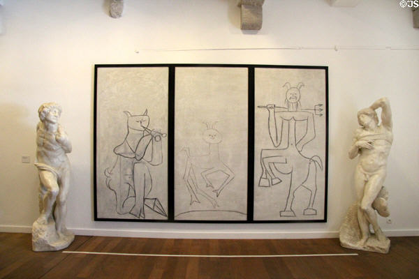 Satyr, Faun & Centaur with a Trident three panel paint & charcoal (1946) by Pablo Picasso flanked by casts of Michaelangelo's slaves at Picasso Museum. Antibes, France.