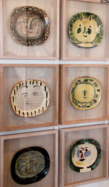 Section of ceramic plate display featuring faces (1947-48) by Pablo Picasso at Picasso Museum. Antibes, France.