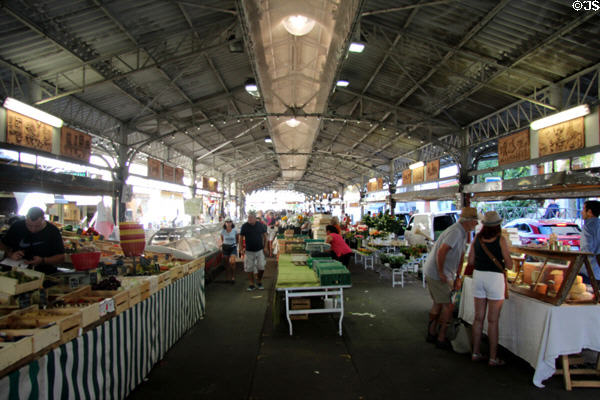 Tables along center aisle of Market Hall. Antibes, France.