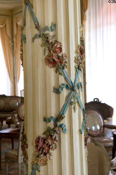 Pillar decorated with sculpted ribbon & flowers in Grand Salon at Villa Ephrussi de Rothschild. Saint Jean Cap Ferrat, France.