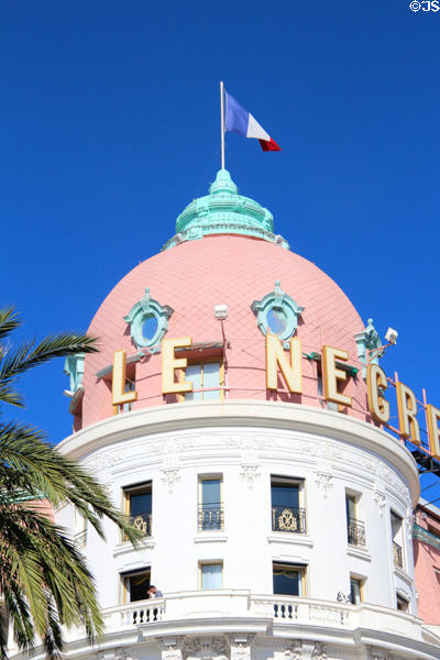 Dome flying French flag of Hotel Le Negresco on Promenade des Anglais. Nice, France.