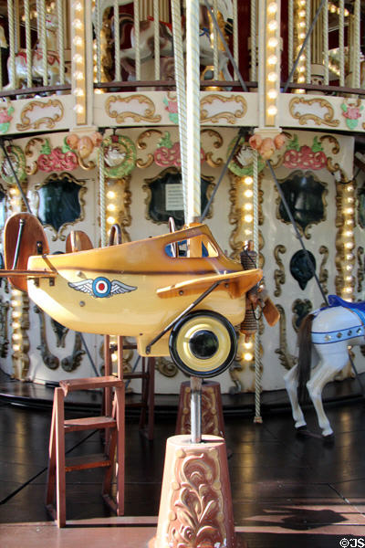 Figure of early plane on carousel in Jardin Albert 1er, Promenade du Paillon. Nice, France.