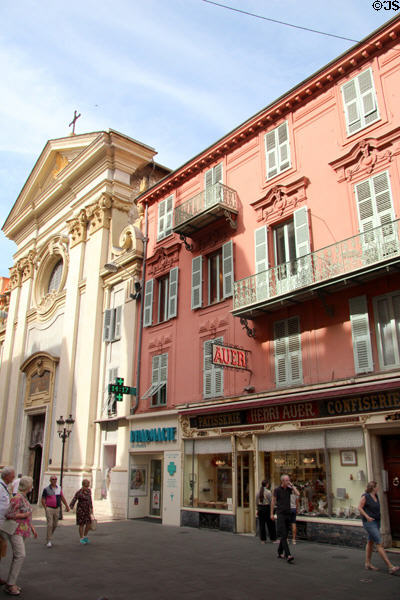 Storefront of long-time Pâtisserie Henri Auer on Rue St François de Paule with former Dominican Church beyond in Old Nice. Nice, France.