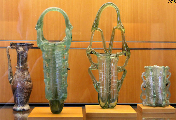 Roman Empire glass perfume flasks & jugs (4th-6thC) from coast of Syria or Palestine at Beaux-Arts Museum. Lyon, France.