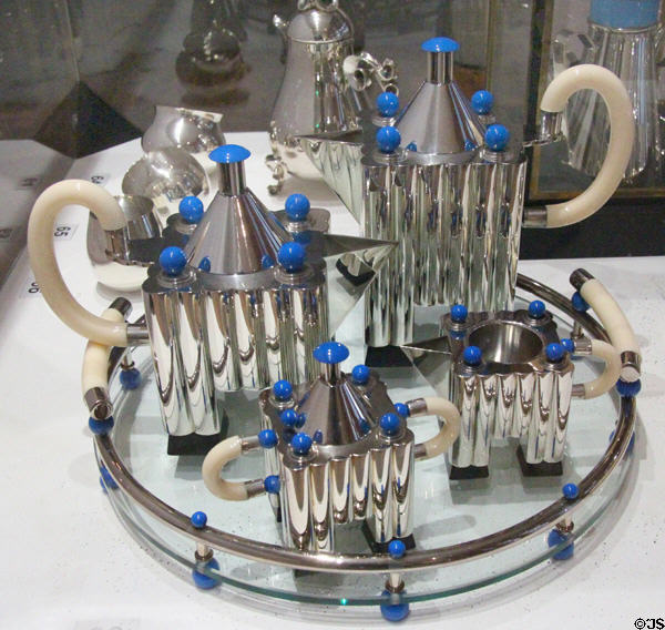 Coffee & tea service in silver & plastic (1983) by Michael Graves for Alessi of Italy at Musées des Arts Décoratifs. Lyon, France.
