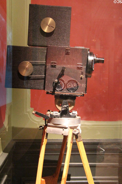 Gaumont camera with sprockets to advance film one frame at a time & exterior film magazine (1908) at Lumière Museum. Lyon, France.