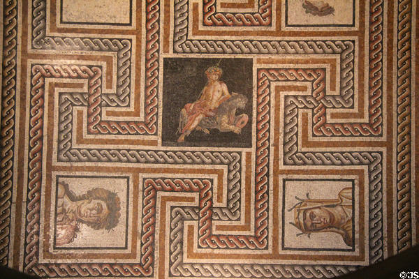 Roman floor mosaic of Bacchus-Dionysus on black panther with characters representing seasons (2nd-3rdC) at Gallo Roman Museum. Lyon, France.