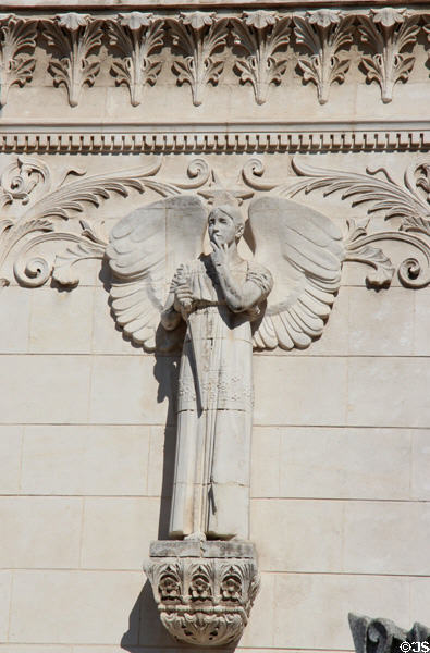 Angel on facade of Basilique Notre-Dame de Fourvière. Lyon, France.