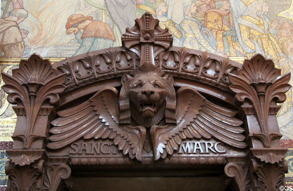 Door lintel with symbol of evangelist St Mark at Basilique Notre-Dame de Fourvière. Lyon, France.