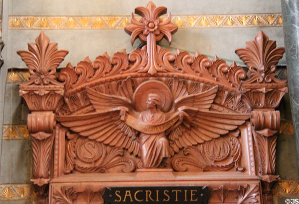 Door lintel with symbol of evangelist St Matthew at Basilique Notre-Dame de Fourvière. Lyon, France.