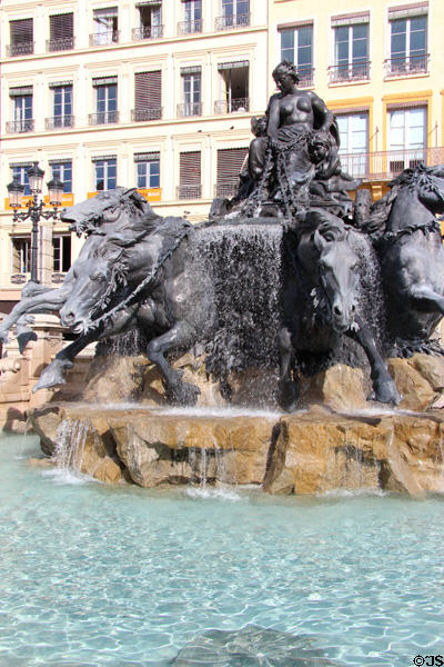 Bartholdi fountain depicts France on chariot controlling horses symbolizing four great rivers of France presented at Exposition Universelle of 1889. Lyon, France.