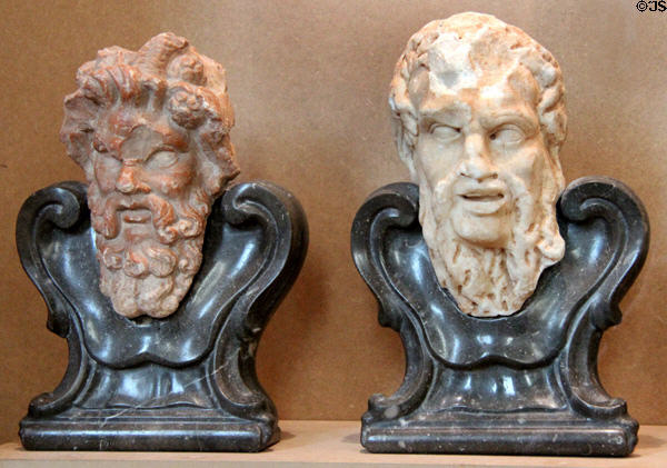 Roman marble heads of satyr & Pan on later Italian mounts at Papal Palace. Avignon, France.