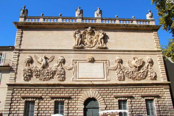 Sculpted facade of Pope Paul V mint building (1619) on Palace Square. Avignon, France.